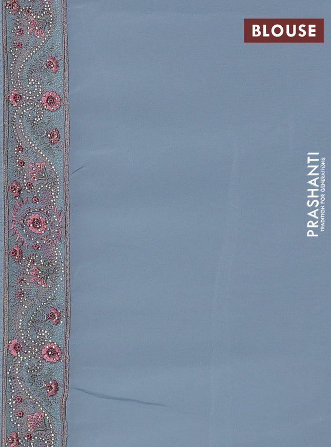 Georgette saree pastel blue with allover paisley embroidery stone work