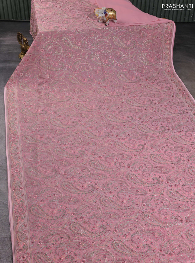 Georgette saree peach pink with allover paisley embroidery stone work