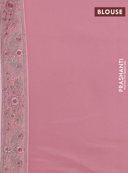 Georgette saree peach pink with allover paisley embroidery stone work