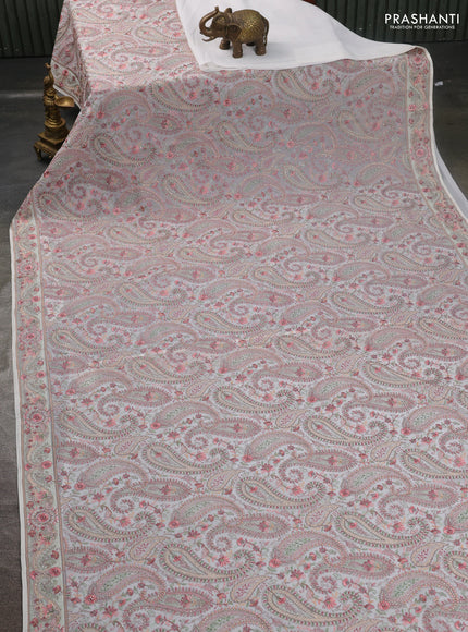 Georgette saree off white with allover paisley embroidery stone work