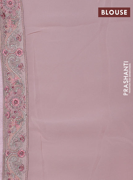 Georgette saree peach shade with allover paisley embroidery stone work