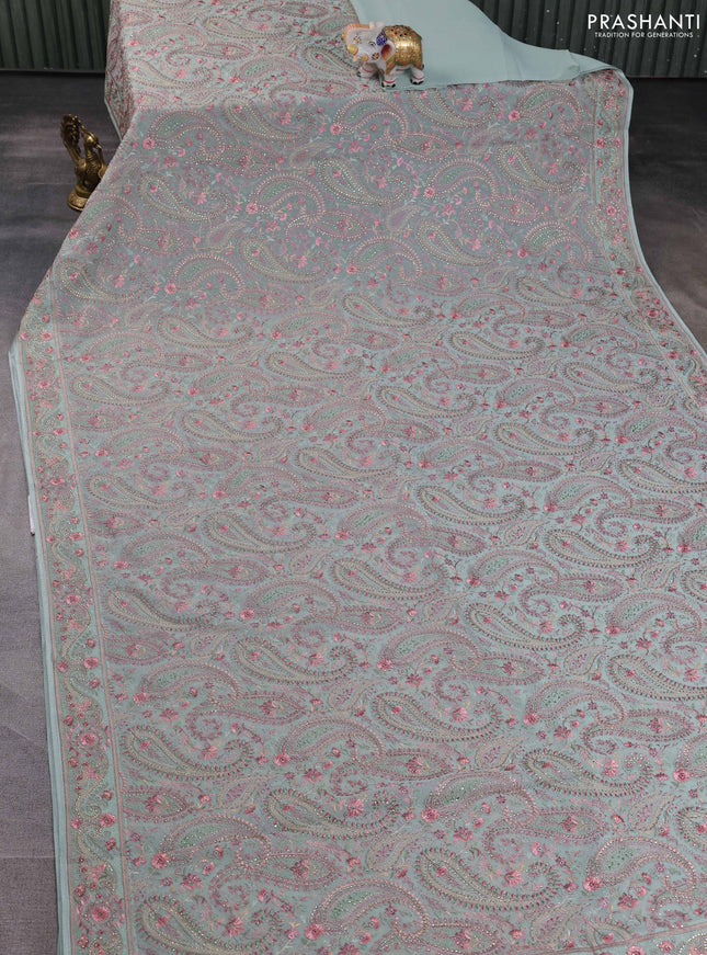 Georgette saree pastel green with allover paisley embroidery stone work