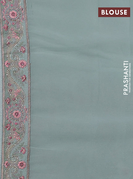 Georgette saree pastel green with allover paisley embroidery stone work