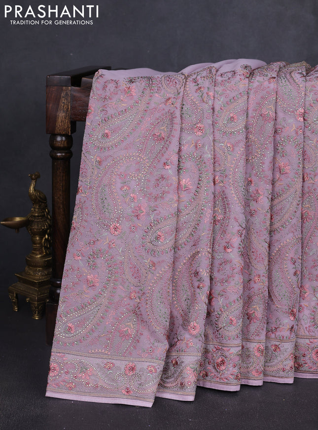 Georgette saree pastel pink with allover paisley embroidery stone work