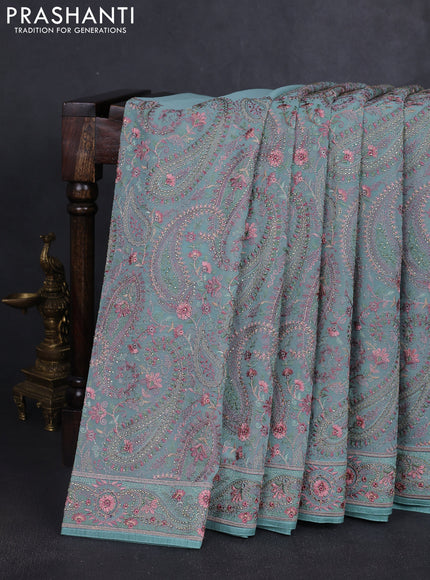 Georgette saree teal green with allover paisley embroidery stone work
