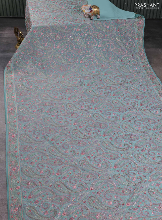 Georgette saree teal green with allover paisley embroidery stone work