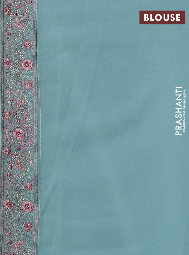 Georgette saree teal green with allover paisley embroidery stone work