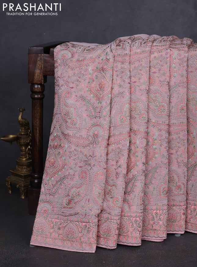 Georgette saree peach shade with allover embroidery stone work