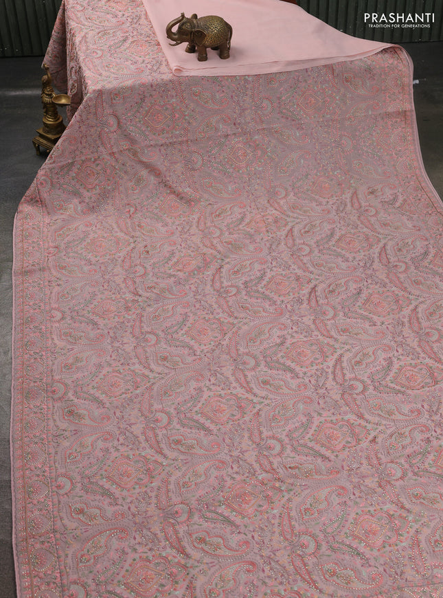 Georgette saree peach shade with allover embroidery stone work