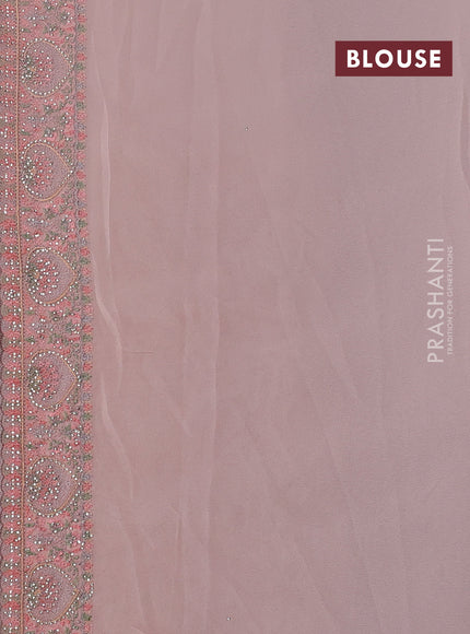 Georgette saree peach shade with allover embroidery stone work
