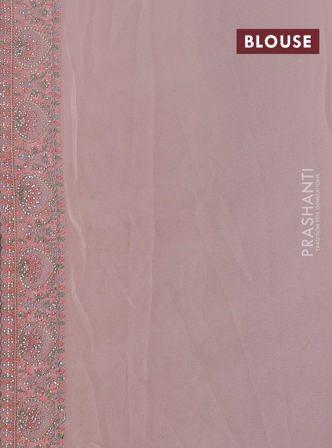 Georgette saree peach shade with allover embroidery stone work