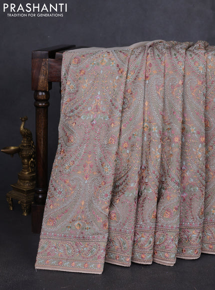 Georgette saree beige with allover paisley embroidery stone work