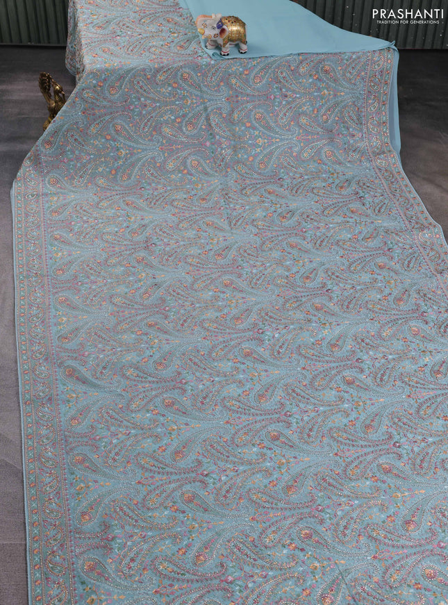 Georgette saree pastel blue with allover paisley embroidery stone work
