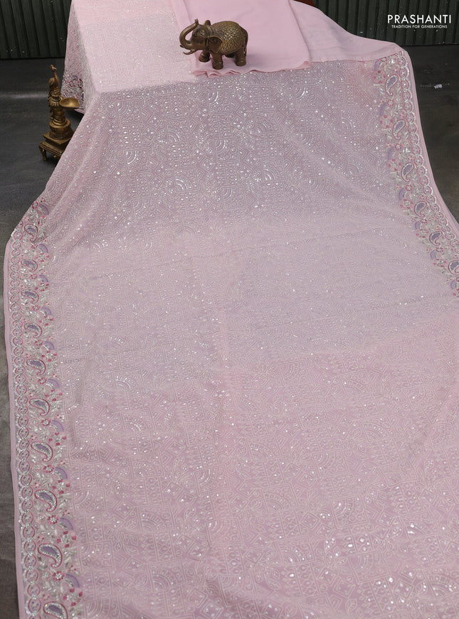 Georgette saree pastel pink with allover sequin embroidery work and embroidery stone work border