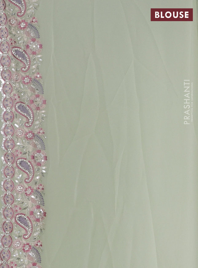 Georgette saree pastel green with allover sequin embroidery work and embroidery stone work border