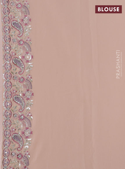 Georgette saree mild peach with allover sequin embroidery work and embroidery stone work border