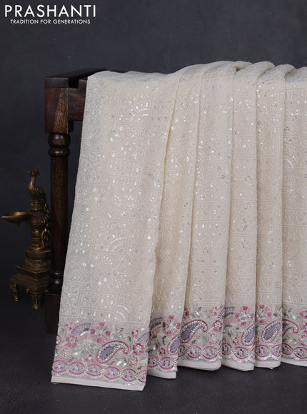 Georgette saree off white with allover sequin embroidery work and embroidery stone work border