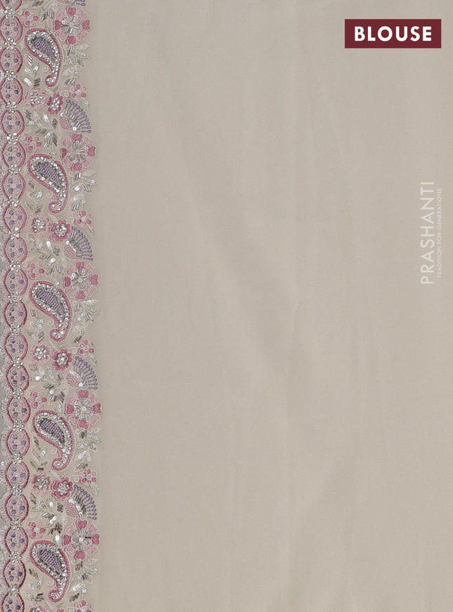 Georgette saree off white with allover sequin embroidery work and embroidery stone work border