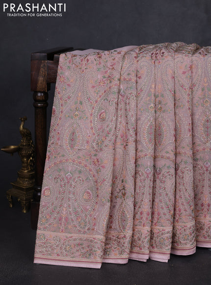 Georgette saree pastel pink with allover paisley embroidery stone work