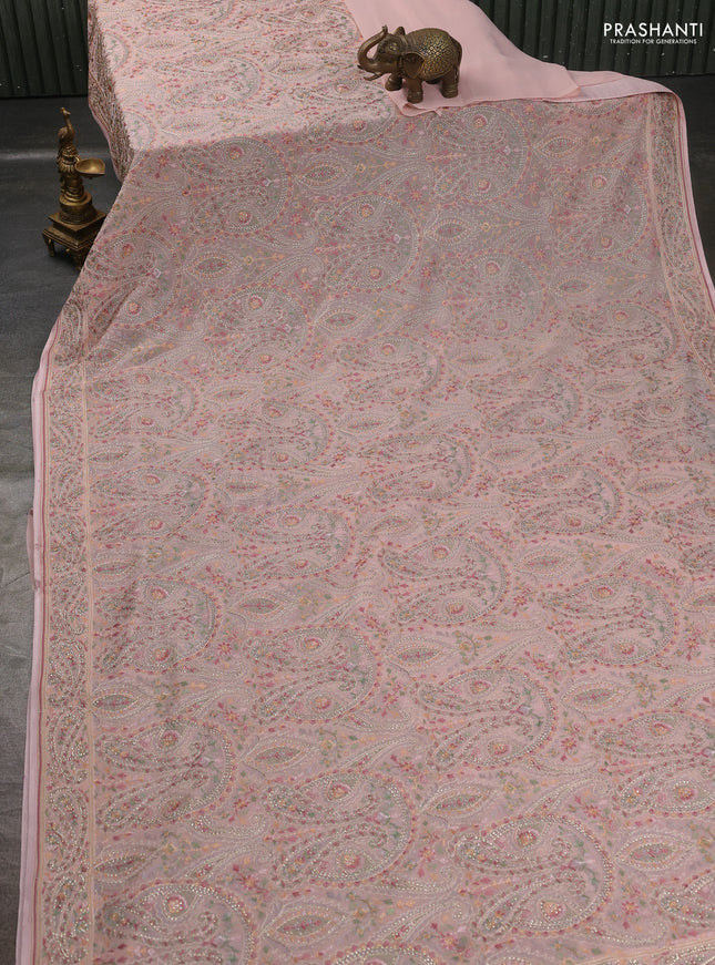 Georgette saree pastel pink with allover paisley embroidery stone work