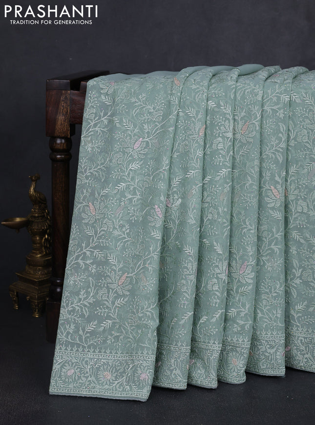 Georgette saree pastel green with allover embroidery work and embroidery border