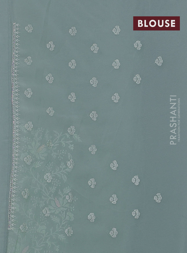 Georgette saree pastel green with allover embroidery work and embroidery border
