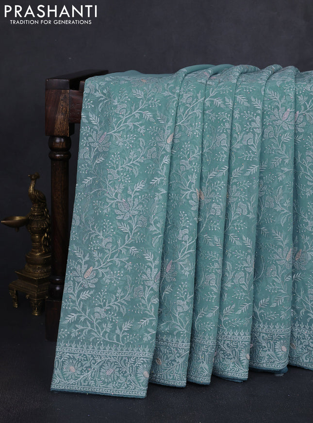 Georgette saree pastel blue with allover embroidery work and embroidery border