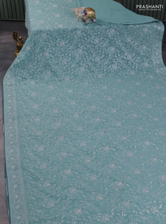 Georgette saree pastel blue with allover embroidery work and embroidery border