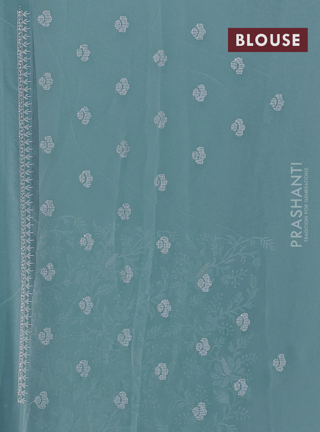 Georgette saree pastel blue with allover embroidery work and embroidery border