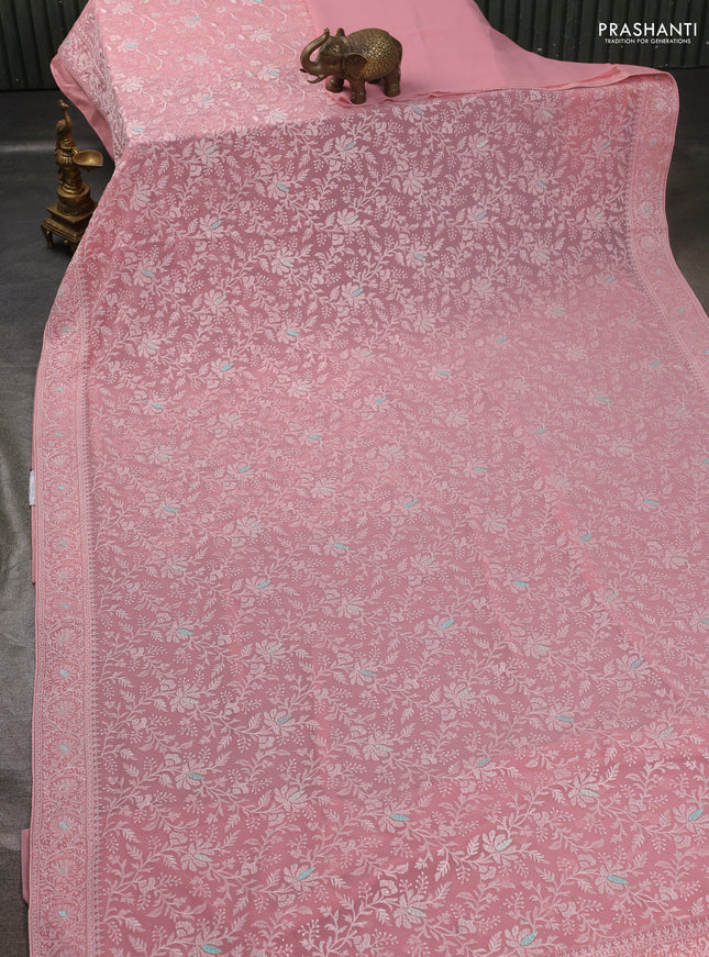 Georgette saree pastel pink with allover embroidery work and embroidery border