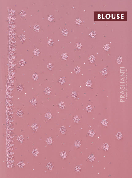 Georgette saree peach shade with allover embroidery work and embroidery border