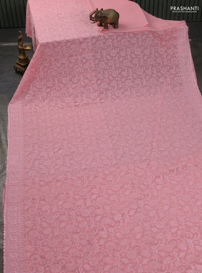 Georgette saree pastel pink with allover embroidery work and embroidery border