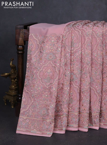 Georgette saree mauve pink with allover embroidery stone work and stone work border