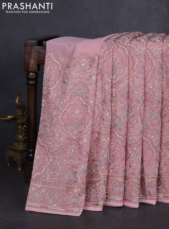 Georgette saree mauve pink with allover embroidery stone work and stone work border