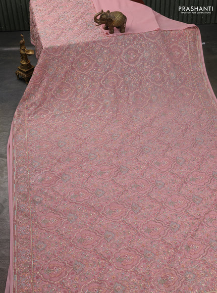 Georgette saree mauve pink with allover embroidery stone work and stone work border