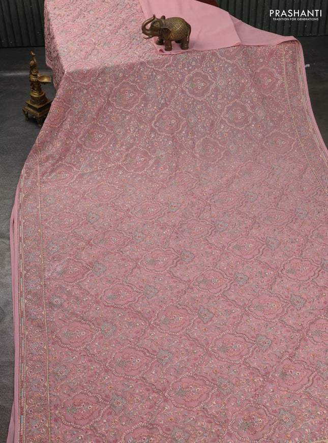 Georgette saree mauve pink with allover embroidery stone work and stone work border