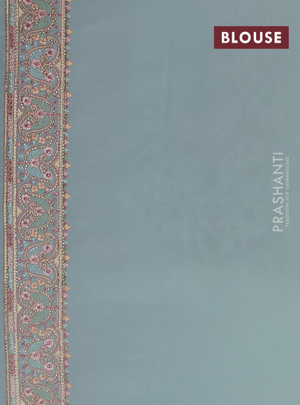 Georgette saree pastel green with allover embroidery stone work and stone work border