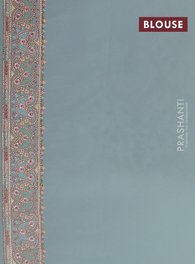 Georgette saree pastel green with allover embroidery stone work and stone work border