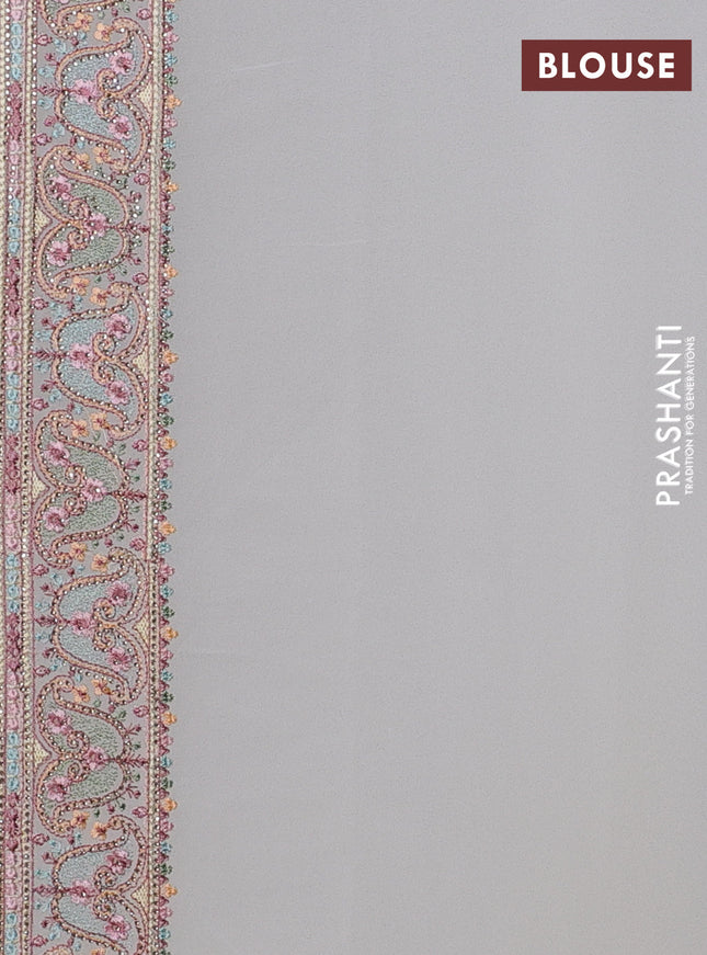 Georgette saree off white with allover embroidery stone work and stone work border