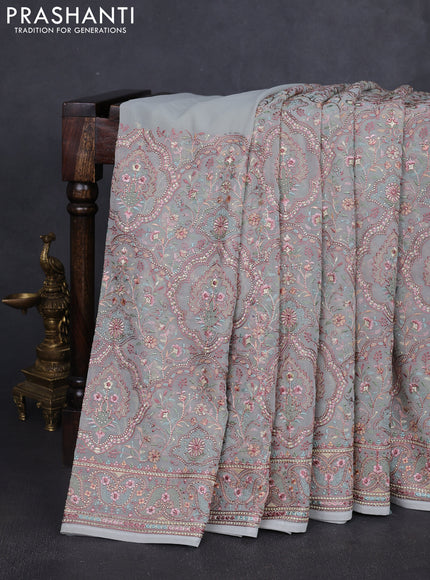 Georgette saree pastel grey with allover embroidery stone work and stone work border