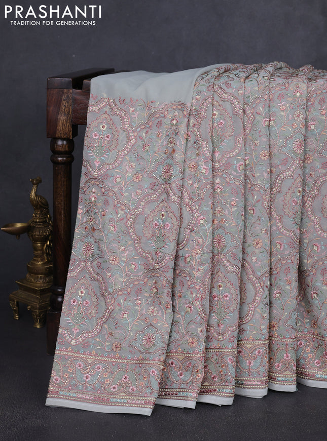 Georgette saree pastel grey with allover embroidery stone work and stone work border