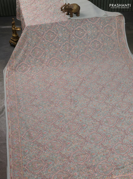 Georgette saree pastel grey with allover embroidery stone work and stone work border