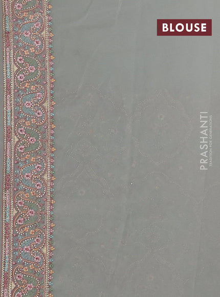 Georgette saree pastel grey with allover embroidery stone work and stone work border