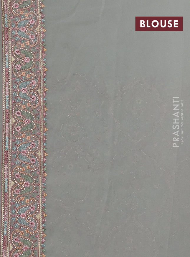 Georgette saree pastel grey with allover embroidery stone work and stone work border
