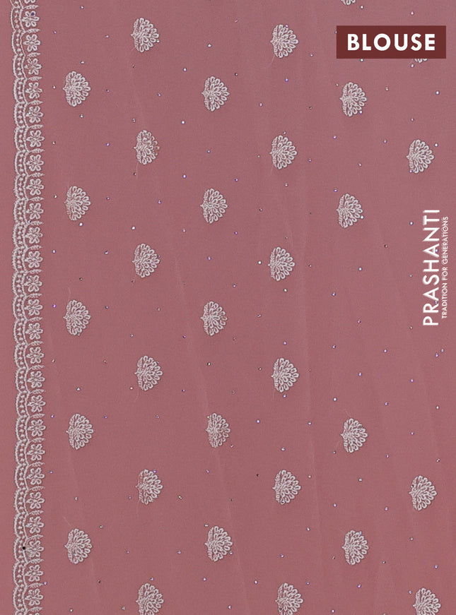 Georgette saree peach shade with allover embroidery work and embroidery border