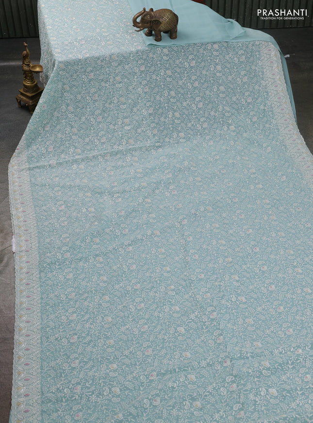 Georgette saree pastel blue with allover embroidery work and embroidery border