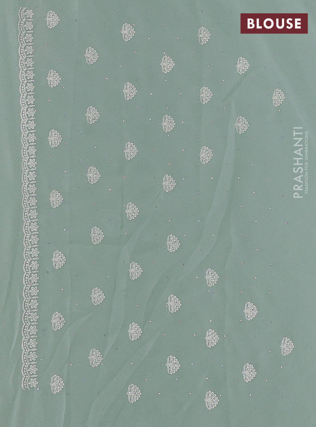 Georgette saree pastel green with allover embroidery work and embroidery border