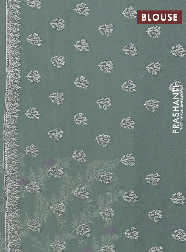 Georgette saree pastel green with allover embroidery work and embroidery border