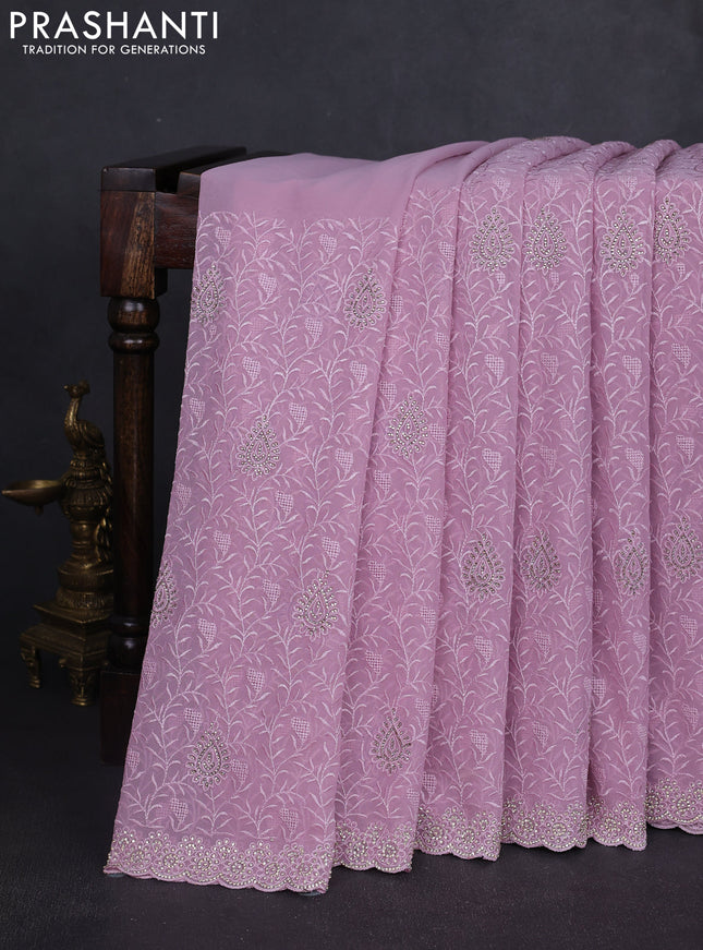 Georgette saree pastel pink and  with allover embroidery stone work and stone work border