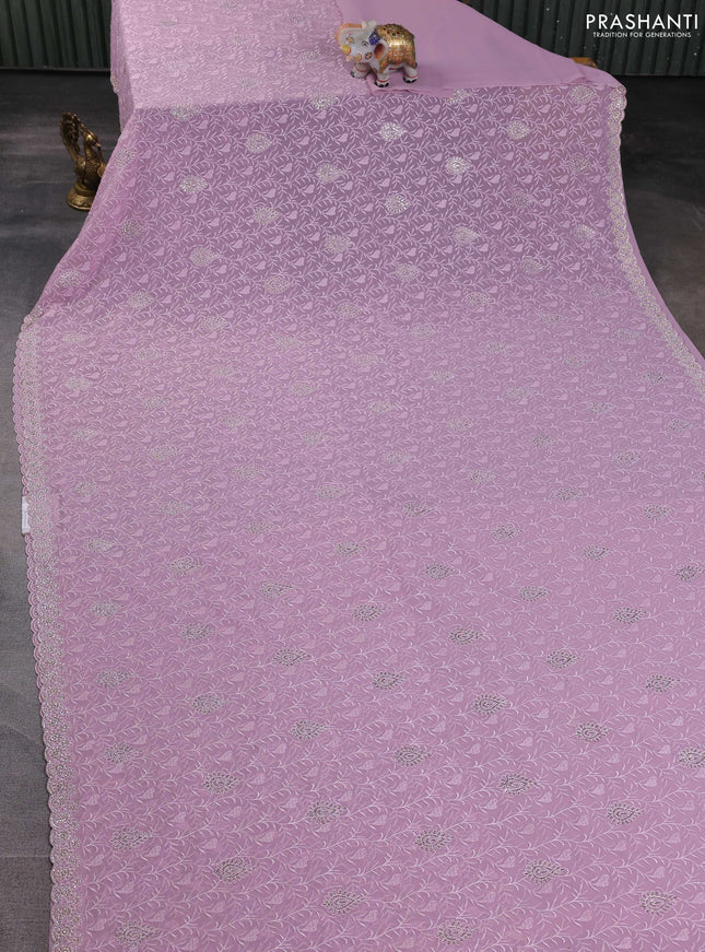 Georgette saree pastel pink and  with allover embroidery stone work and stone work border